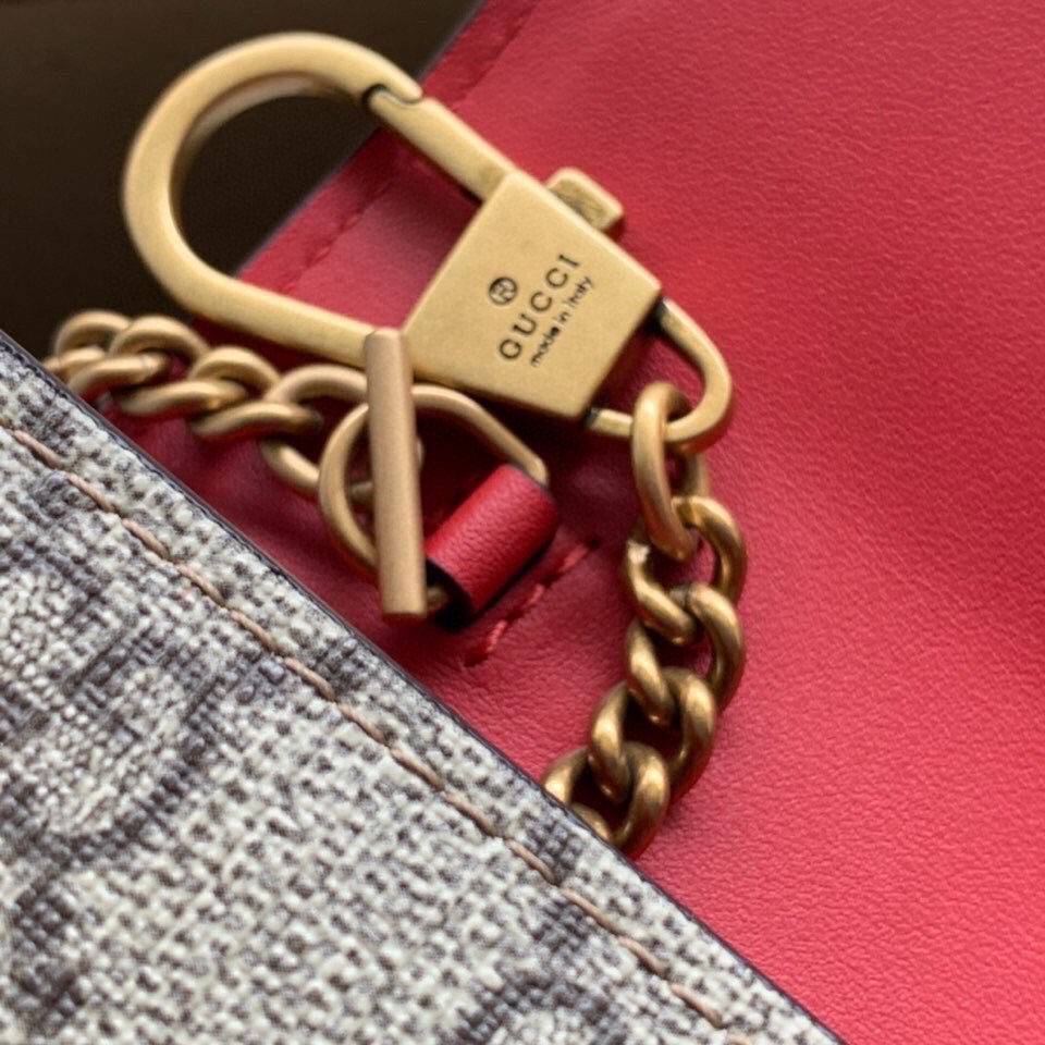 G*u*i cherry wallet