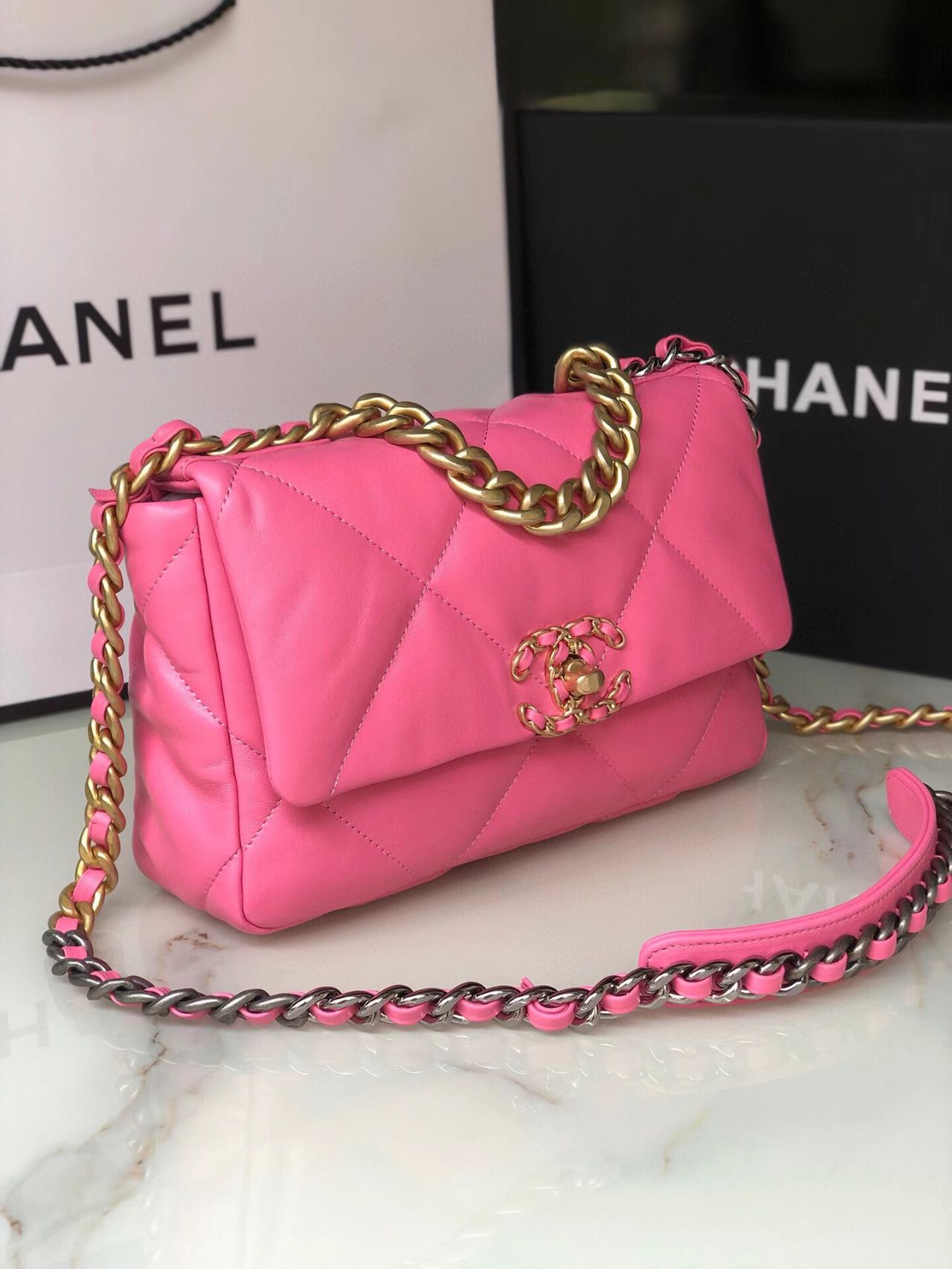 pink Ch*el flap bag
