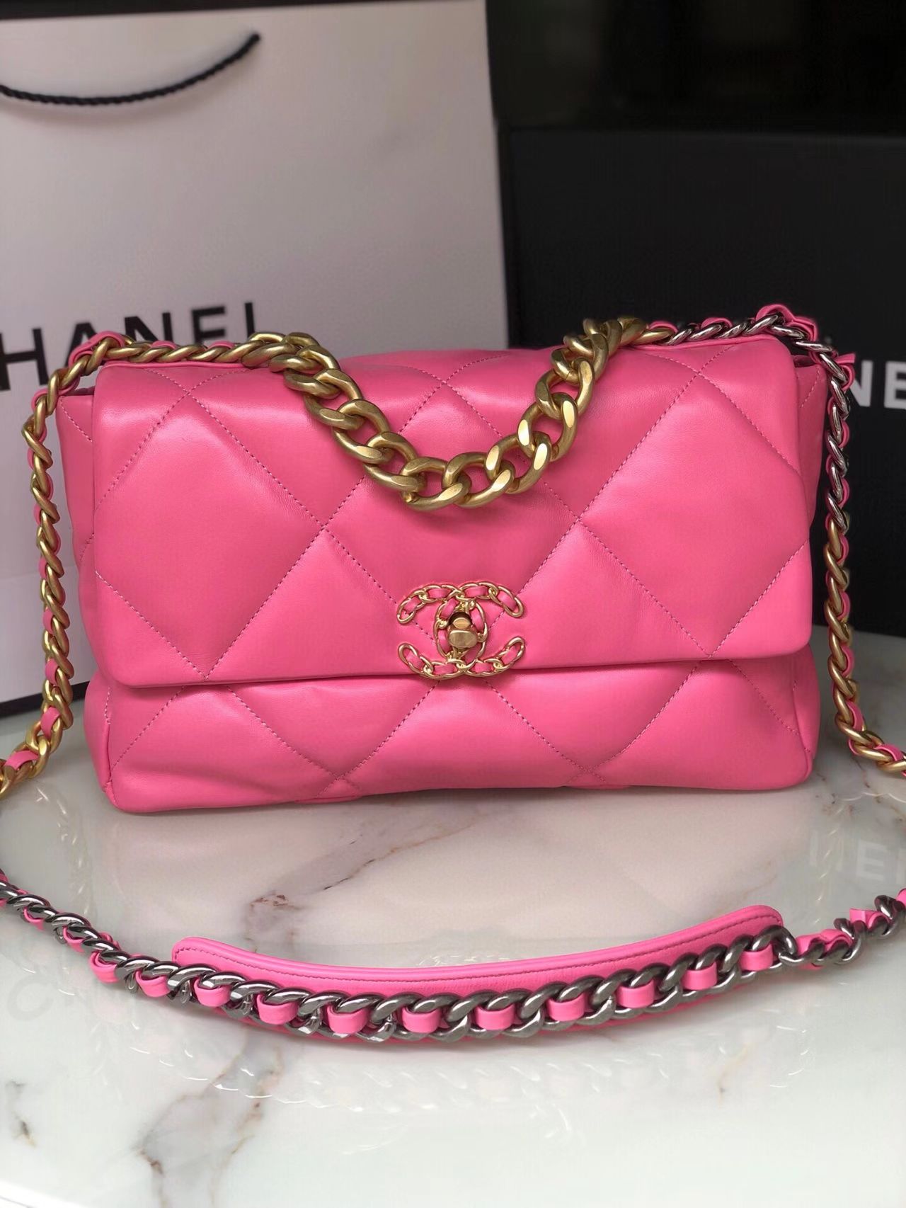 pink Ch*el flap bag
