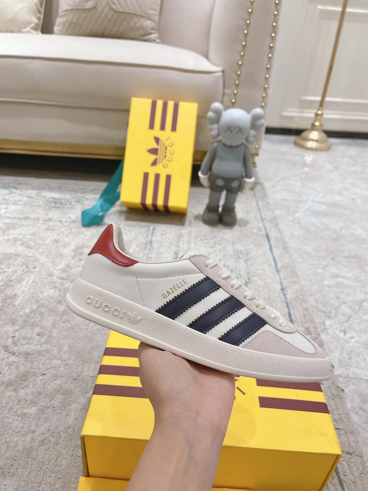 ad*s x G*u*i men’s gazelle sneaker