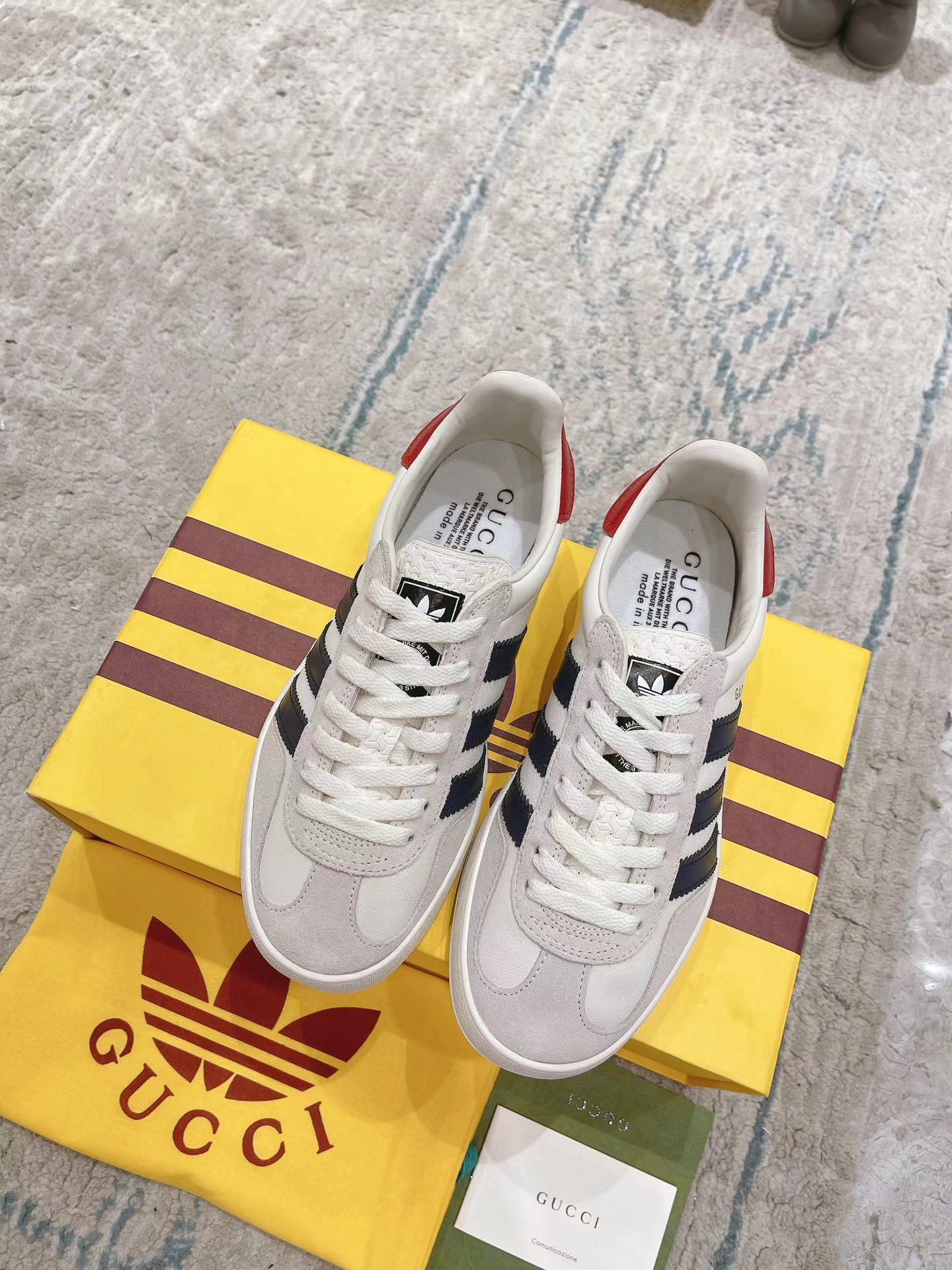 ad*s x G*u*i men’s gazelle sneaker