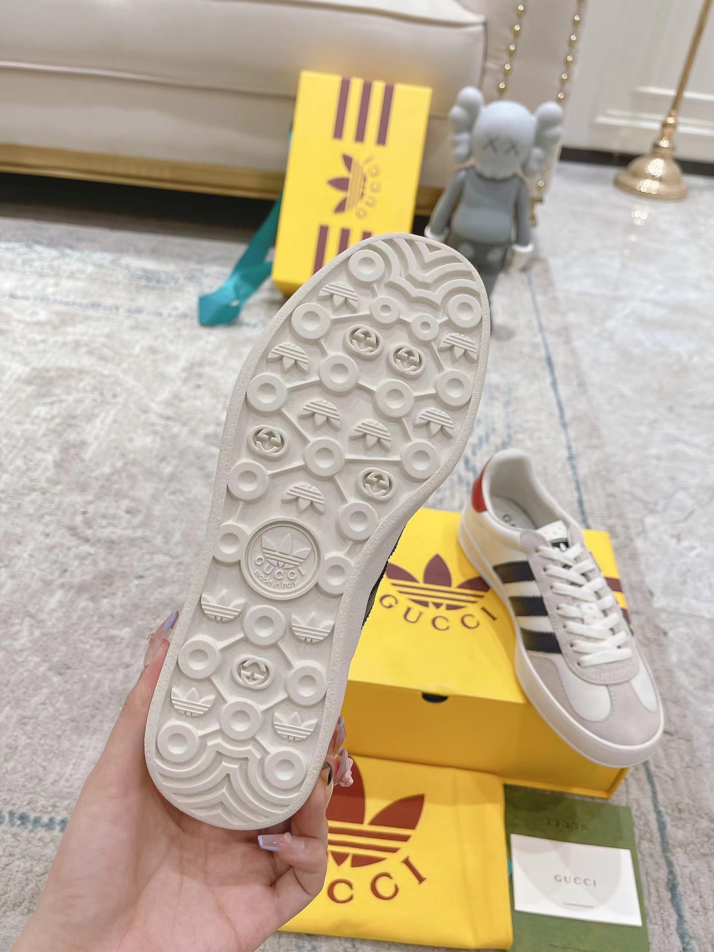 ad*s x G*u*i men’s gazelle sneaker