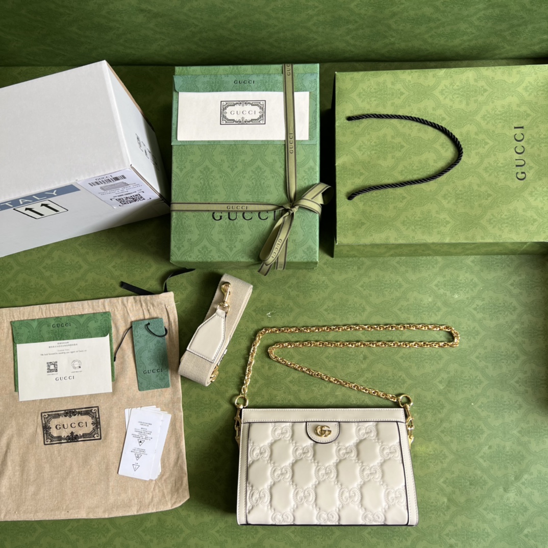GG Matelassé leather small bag