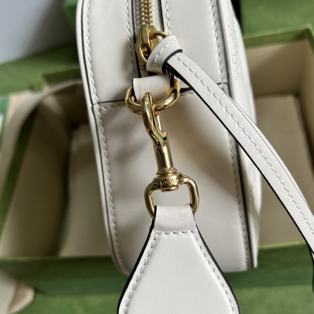 GG Matelassé leather small bag