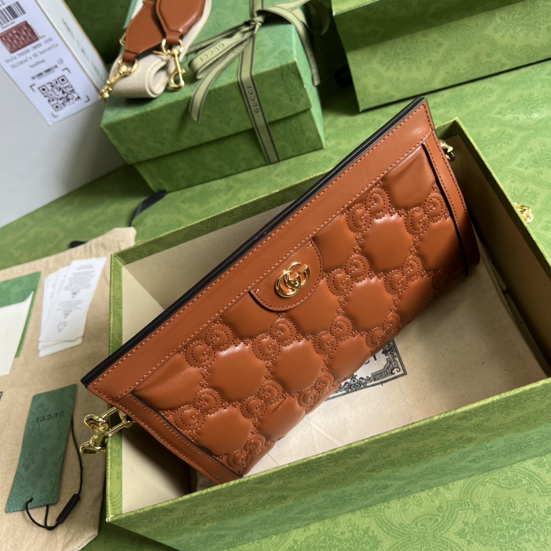 GG Matelassé leather small bag