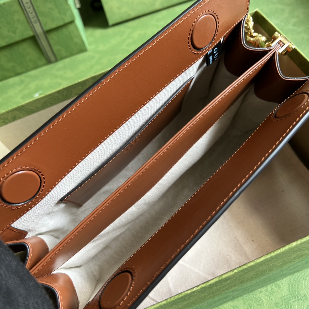 GG Matelassé leather small bag