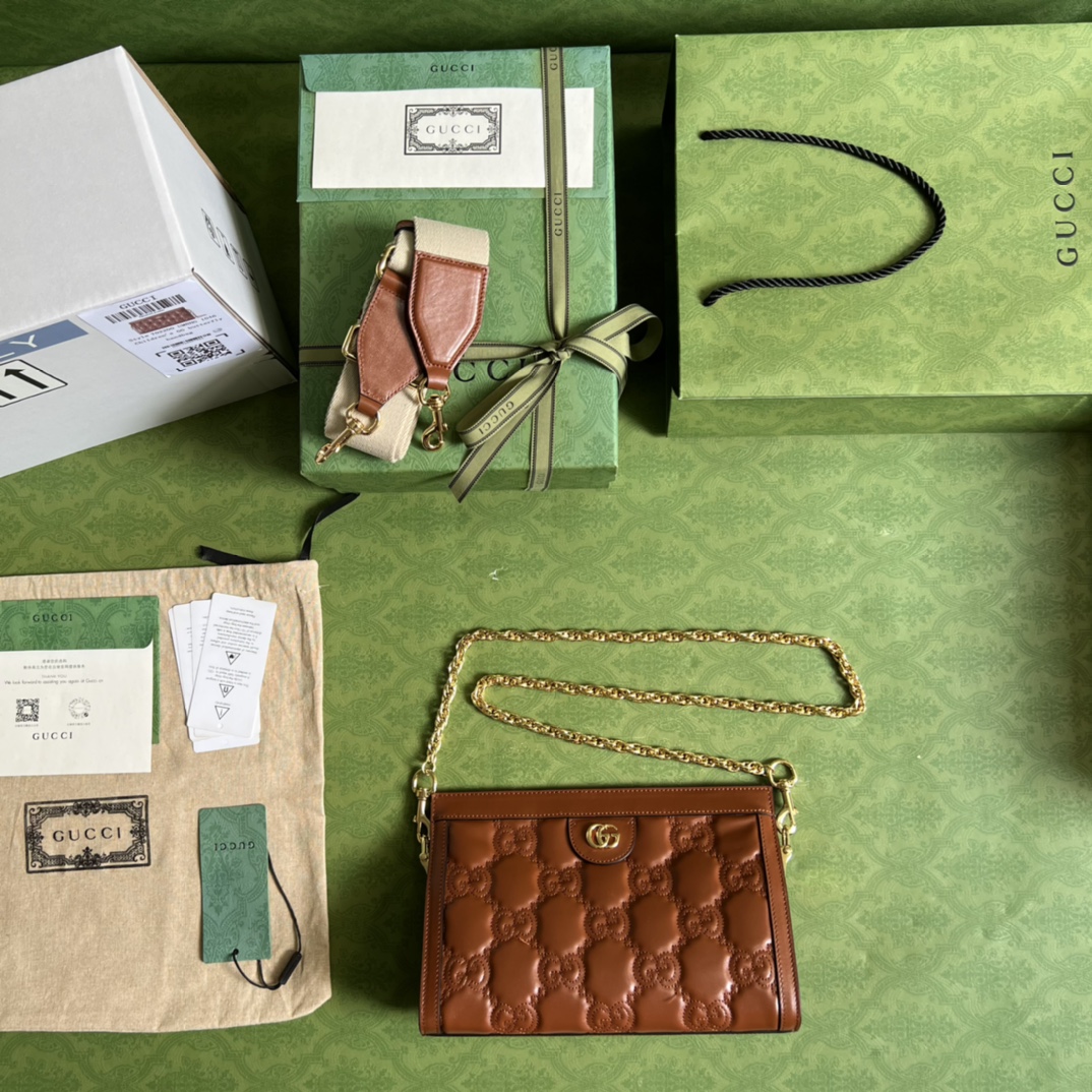 GG Matelassé leather small bag