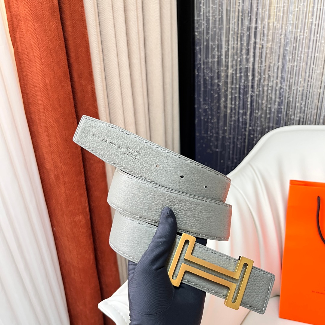 H au Carre belt buckle