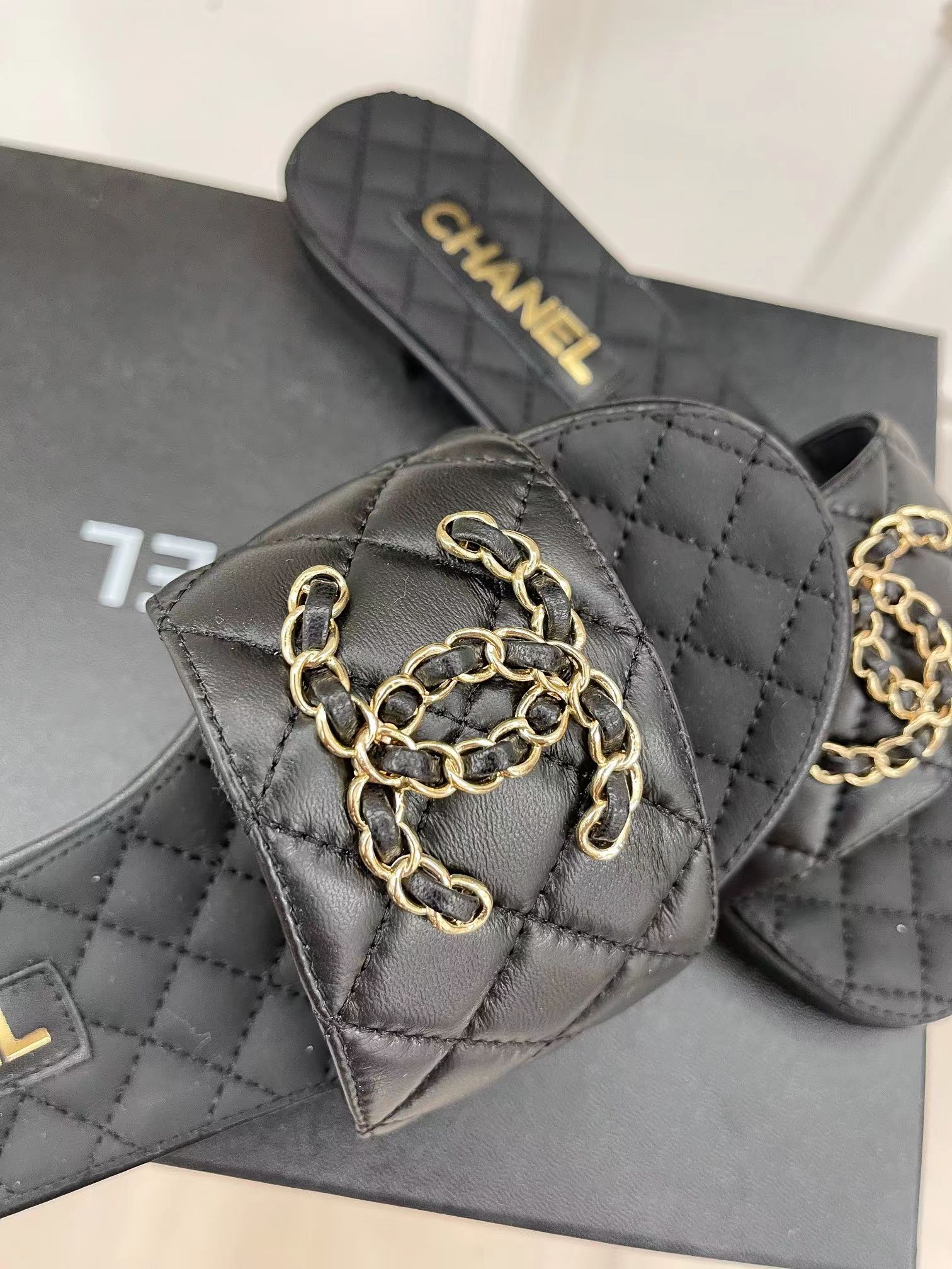Ch*el goatskin shiny leather gold cc flat sandals