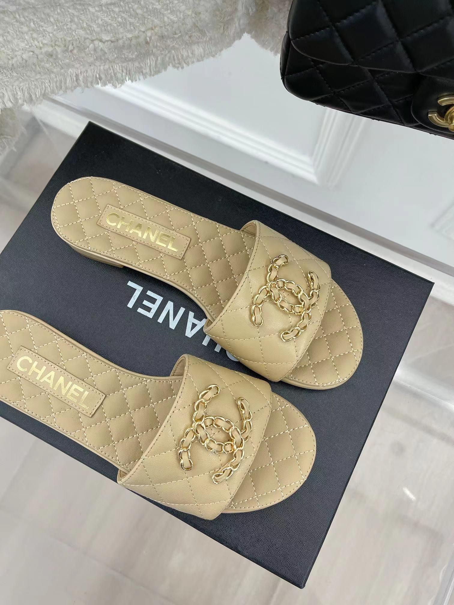 Ch*el goatskin shiny leather gold cc flat sandals