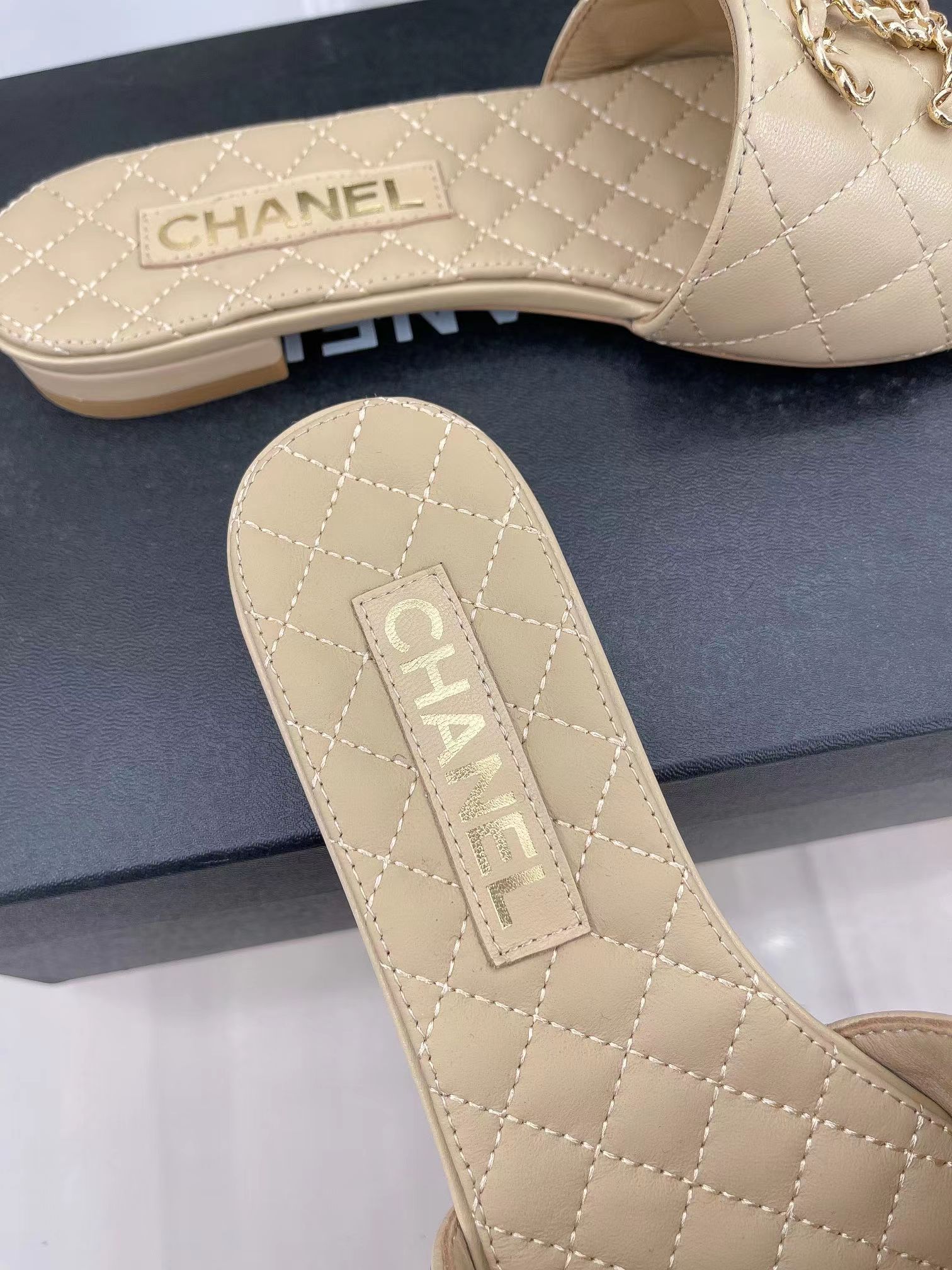 Ch*el goatskin shiny leather gold cc flat sandals