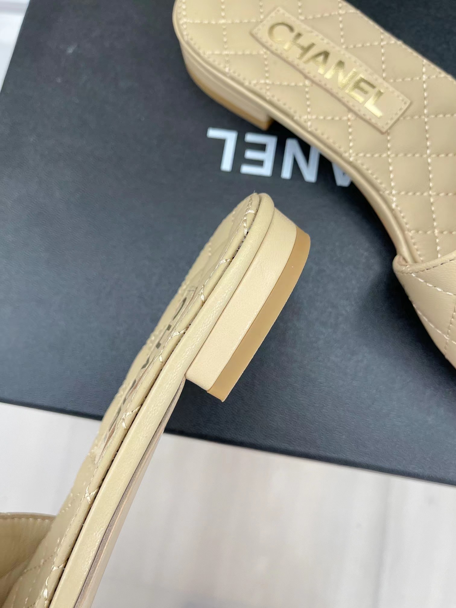 Ch*el goatskin shiny leather gold cc flat sandals