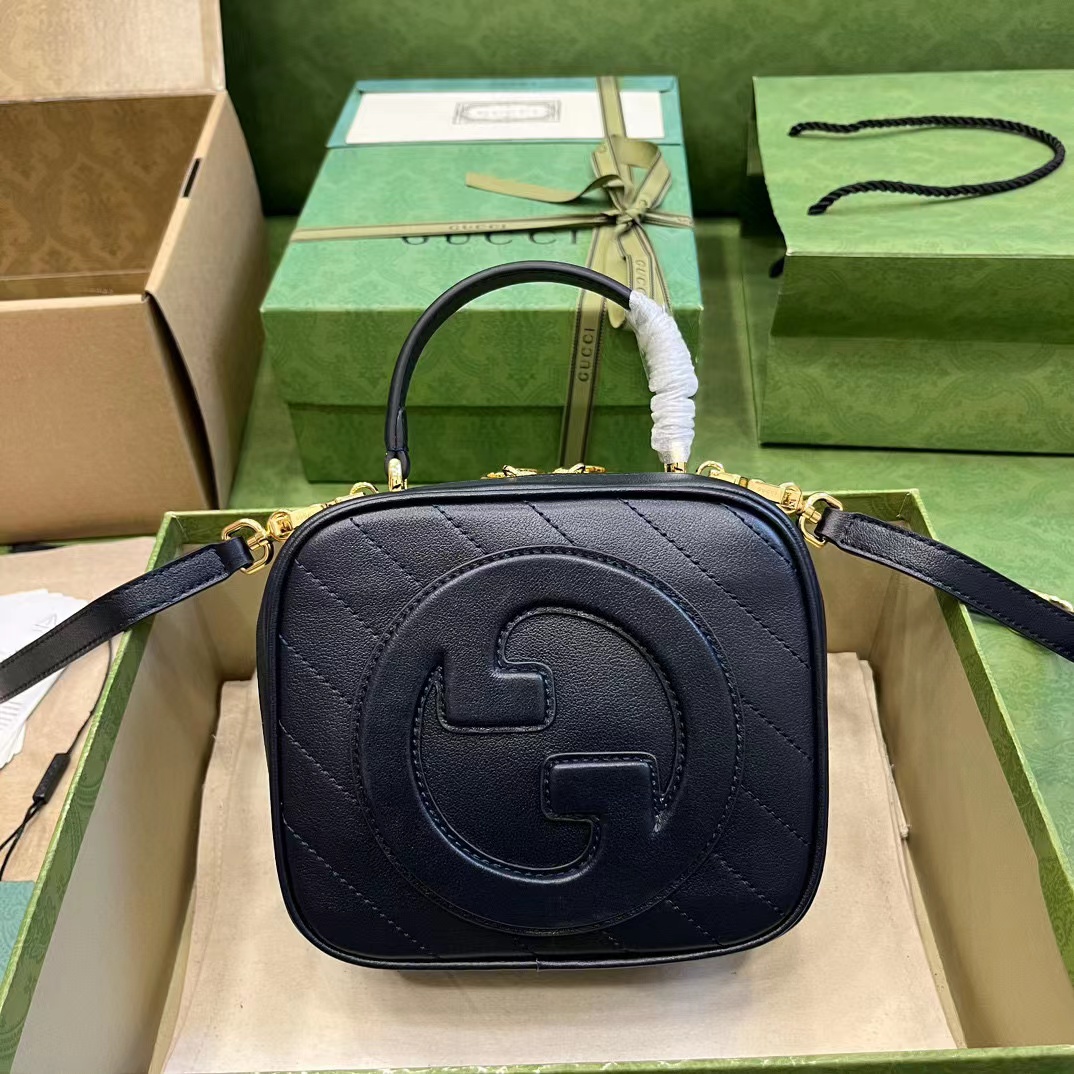 G*u*i soho camera bag