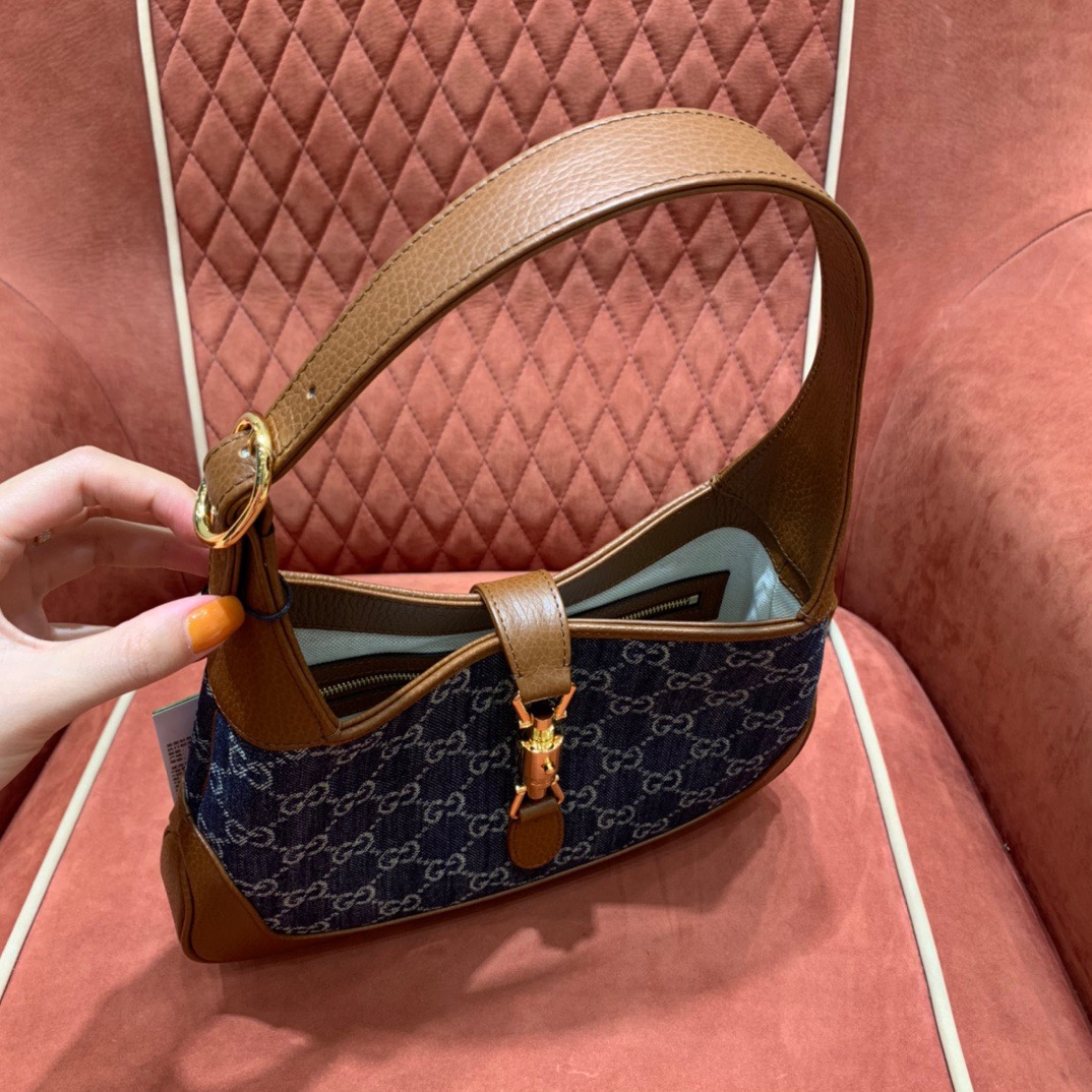 Gucc1 denim handbag