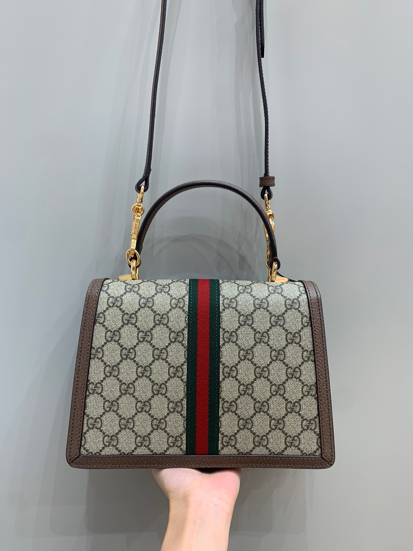 Ophidia Top handle bag
