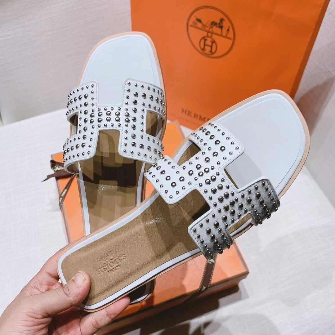 H**mes oran slides