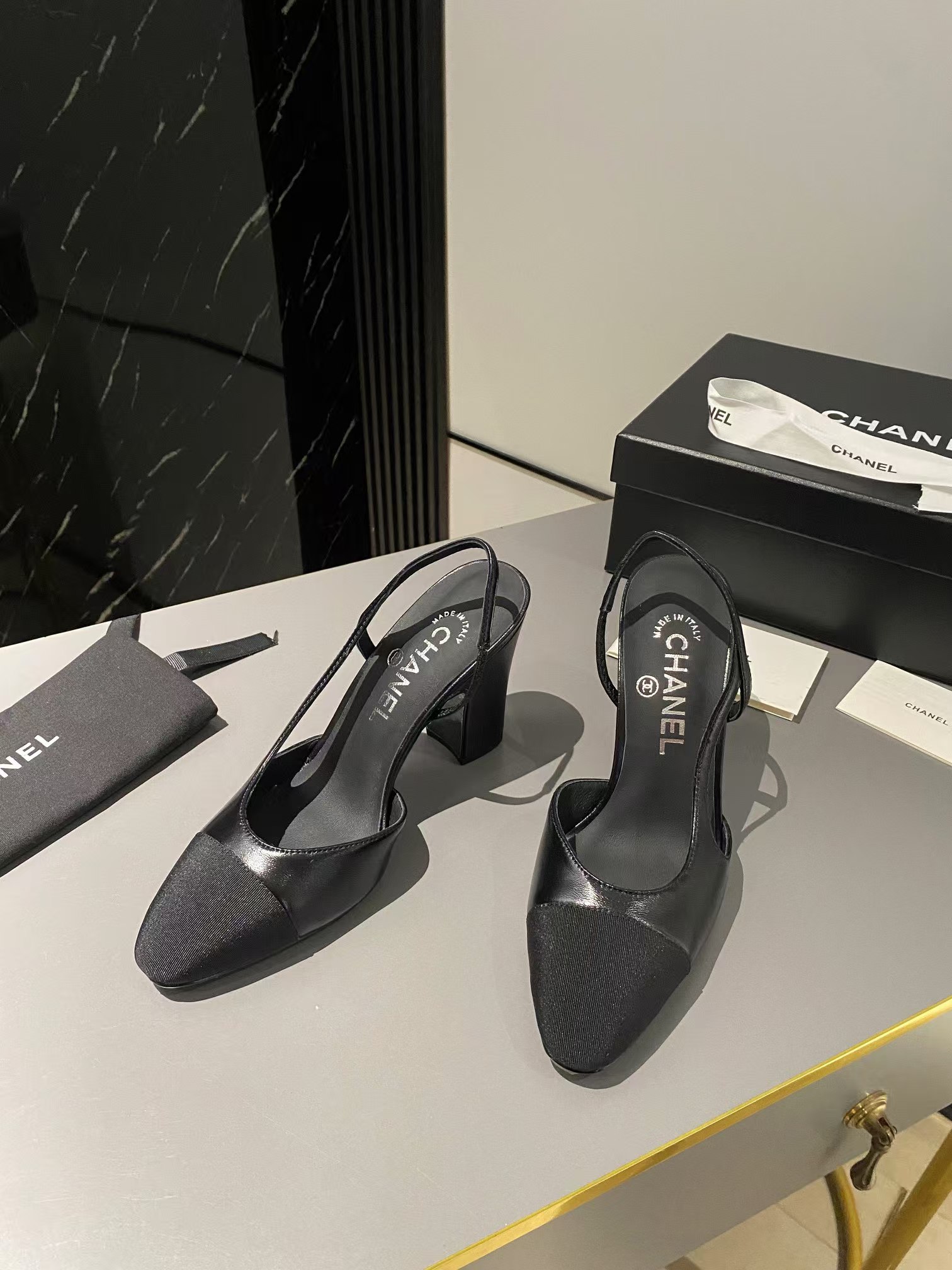 Ch*el lambskin slingback