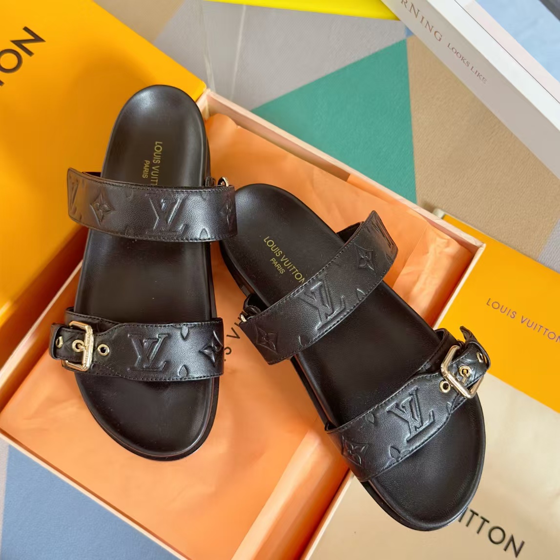 l**is V*t*n bom dia leather mules
